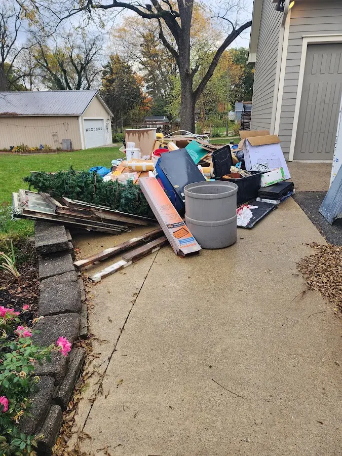 Dumpster being loaded with debris for 30 Yard Dumpster Rental in Dunn Loring